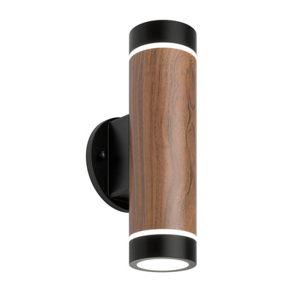 The Artika C7 indoor-outdoor LED wall light features a modern cylindrical design with a wood grain finish and black accents, emitting light from both ends.