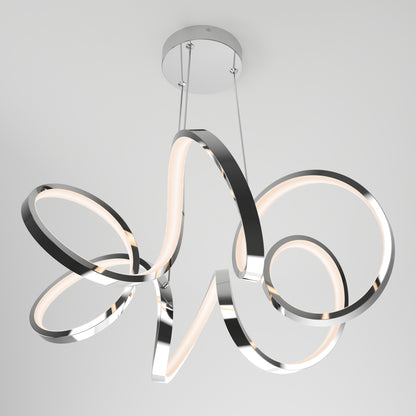 The Artika Swirl Ribbon LED pendant light features three intertwined metallic loops with integrated LEDs, suspended by two cables from a round ceiling mount for a modern look.