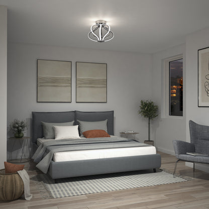 A modern bedroom featuring a gray upholstered bed, neutral bedding, abstract wall art, a striped rug, small side table with vase, potted plant, and the Meridian LED flush mount light by Artika as a unique ceiling fixture.