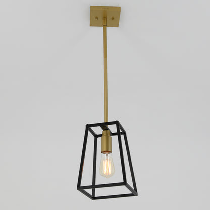 The Carter 1-light pendant by Artika features a gold rod and fixture, an exposed bulb, and a geometric black metal frame, suspended elegantly from a white ceiling.