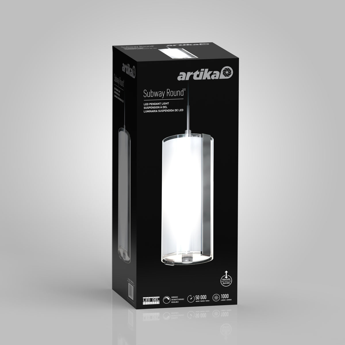 A black retail box features the Artika brand and an image of a cylindrical LED pendant light called Subway Round, with product details and icons displayed on the front. The background is light gray.