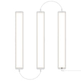 Three slim, rectangular LED light panels are connected by cables, arranged vertically in a row on a white background. The lights emit a bright, even glow.