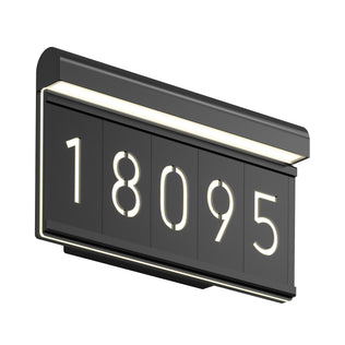 The Artika Bowen modern LED outdoor address wall light 5 CCT displays the numbers 18095 in large illuminated white digits on a sleek black rectangular frame, with integrated top-edge lighting for clear visibility.