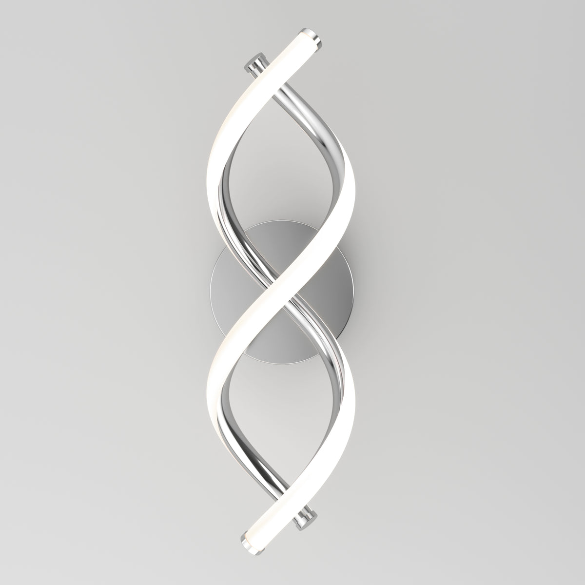 A modern wall sconce with two intertwined LED light tubes, one metallic and one glowing white, mounted on a round silver base against a plain light gray background.