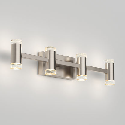 The Artika Mist modern LED bathroom vanity light 5 CCT features four cylindrical lights with clear textured glass ends and a brushed nickel finish, wall-mounted and set against a light gray background.