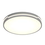 A modern, round, flush-mount LED ceiling light with a white diffuser and a slim, gray rim featuring small cut-out accents.