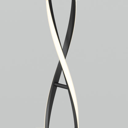 The Artika Swirl modern LED floor lamp features two intertwined, curved light strips—one black and one glowing white—displayed against a plain light gray background.
