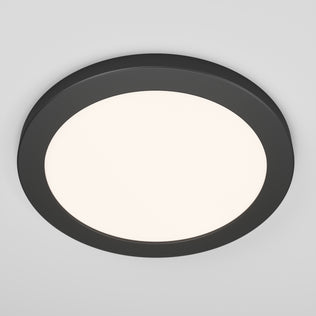 The Artika Europa Disk 9 in. LED modern flush mount light features a sleek black frame and diffused white center, installed on a plain white ceiling. It offers 3 selectable color temperatures (CCT) for versatile illumination.