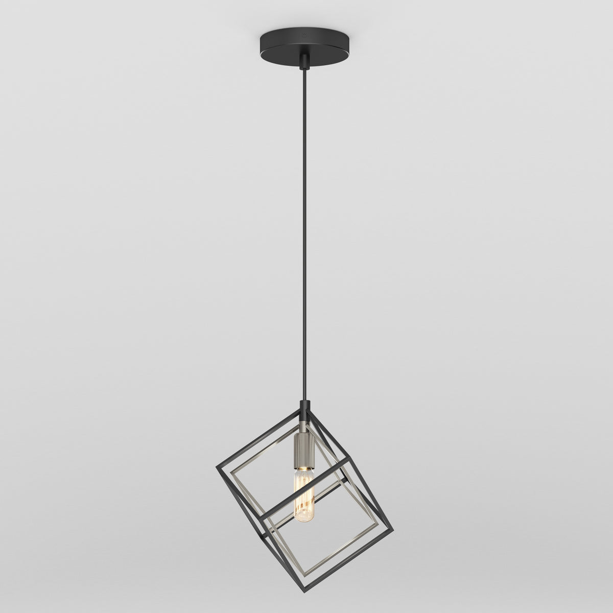 The Artika Imperium Single pendant light features a geometric open metal cube frame with an exposed bulb, black cord, and ceiling mount, showcased against a plain white background.