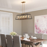 A modern dining room with a wooden table, gray upholstered chairs, a rectangular chandelier with exposed bulbs, white dishes set on the table, light beige walls, and a large abstract pink artwork.