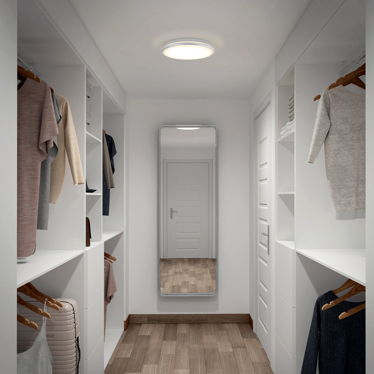 A modern walk-in closet with white shelves and hanging clothes on both sides, a full-length mirror at the end, wooden floor, and a round ceiling light.