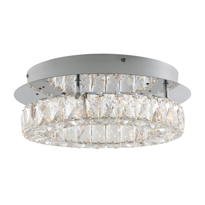 The Artika Celebrity LED flush mount light features two circular rows of large rectangular crystal accents and a silver metallic base, offering a sparkling, modern look for your ceiling.