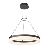 A modern, circular pendant light with a black frame, suspended by three thin wires from a round ceiling mount. The fixture emits a soft, diffused white light around its ring.
