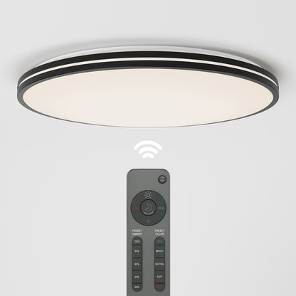 The Artika Athos 21 in. LED flush mount light features a glowing white surface and comes with a remote for adjusting brightness, color temperature, and preset modes. A wireless icon shows its remote connectivity.