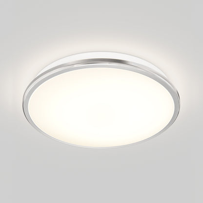 The Artika Vera 13 in. LED modern flush mount light features a frosted white cover and silver trim, mounted on a white ceiling to emit a soft, even glow.