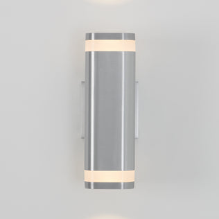 The Artika Mettle LED indoor-outdoor wall light features a sleek stainless steel cylindrical design with illuminated frosted bands, adding contemporary style and energy efficiency to any space.