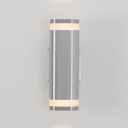 The Artika Mettle LED indoor-outdoor wall light features a sleek stainless steel cylindrical design with illuminated frosted bands, adding contemporary style and energy efficiency to any space.