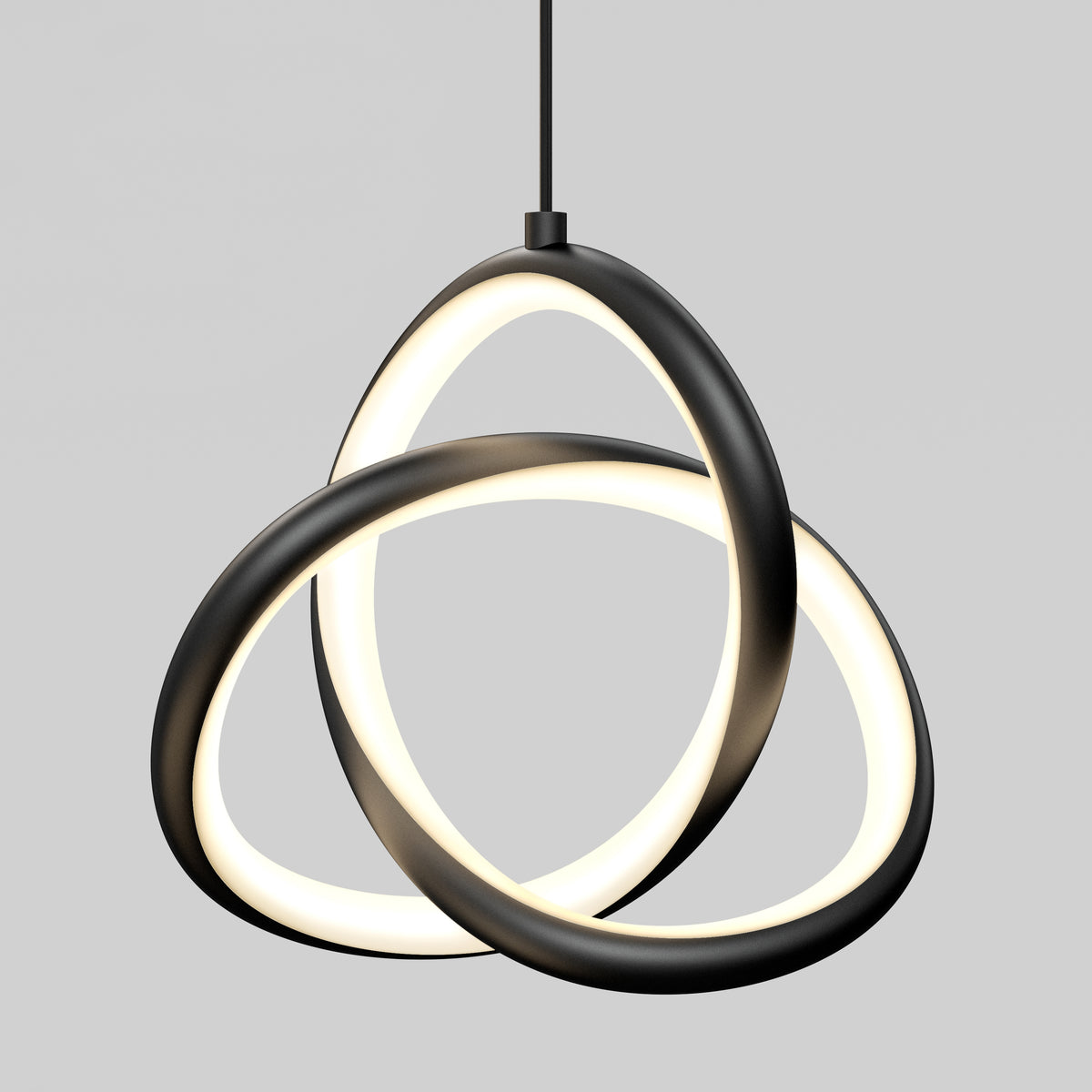 The Artika Zephyr 3-light LED pendant features three interlocking illuminated rings with a black frame, suspended from the ceiling against a plain gray background.