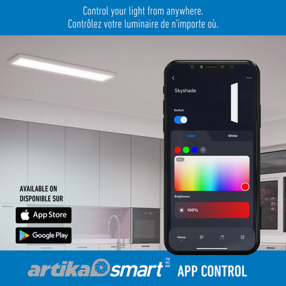A smartphone shows the Artika Skyshade smart RGB LED light panel app with color and brightness controls in a modern kitchen. Text above reads, Control your light from anywhere, in English and French. App store logos and Artika Smart APP CONTROL appear.