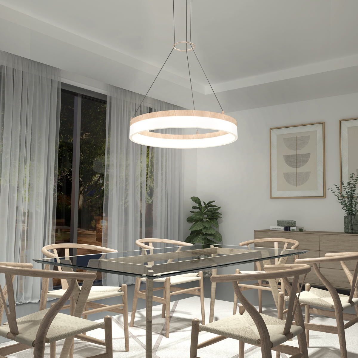 A modern dining room with a glass table, six wooden chairs, a circular pendant light, large window with sheer curtains, minimalist wall art, a sideboard, and potted plants.