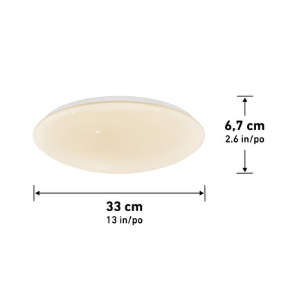The Artika Empress 13 in. LED modern flush mount light features a soft warm glow. Diagram shows dimensions: 33 cm (13 in) wide, 6.7 cm (2.6 in) tall, with black arrows marking width and height measurements.