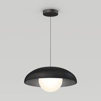 The Artika Boden LED modern mid-century pendant light features a black dome-shaped shade and glowing white globe bulb, hanging from a thin black cord, ideal for contemporary spaces.