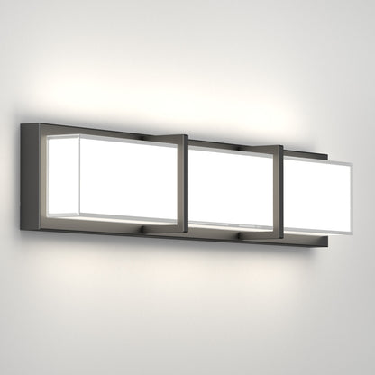 The Artika Subway LED bathroom vanity light features three rectangular frosted glass shades framed in dark metal, providing soft white illumination and a modern touch to your wall.