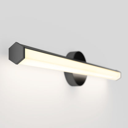 The Artika Ewen modern LED bathroom vanity light 5 CCT features a rectangular black frame, round black base, and emits warm white light, creating a sleek look on a light gray wall.