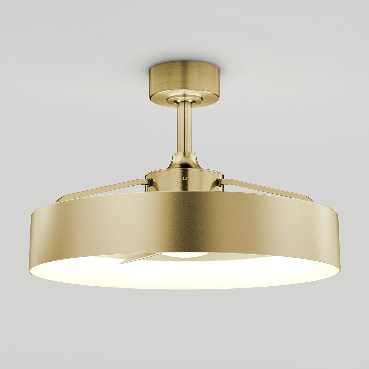 A modern brass semi-flush mount ceiling light with a round drum shade and exposed bulb, mounted on a white ceiling.