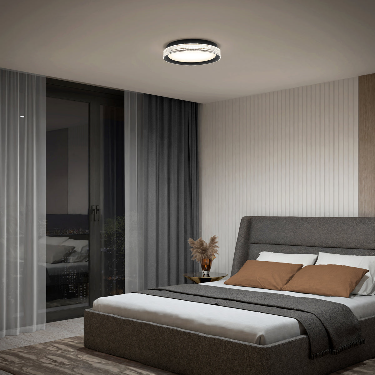 Modern bedroom with a gray upholstered bed, brown and white bedding, a bedside table with dried flowers, floor-to-ceiling curtains, glass doors, and a round ceiling light. Neutral tones and minimalistic decor.