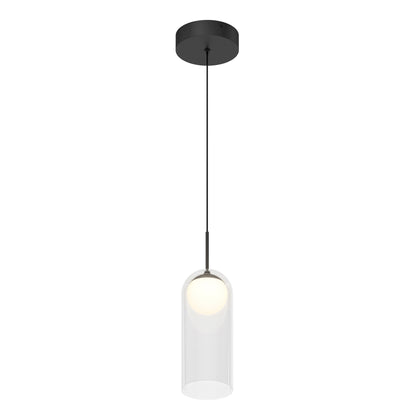 The Artika Mirah LED modern mid-century pendant light 3 CCT features a black ceiling mount, a slim black cord, and a clear cylindrical glass shade encasing a glowing white bulb.