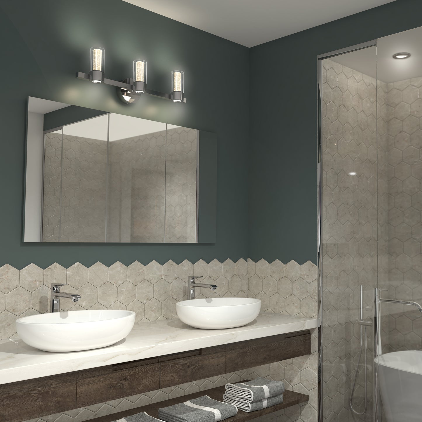 Modern bathroom with two vessel sinks, wall-mounted faucets, a large mirror, hexagonal beige tile backsplash, glass shower enclosure, and an Artika Novello modern LED bathroom vanity light above the mirror. Folded towels sit on the counter.