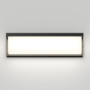 The Artika Bristol modern LED bathroom vanity light 3 CCT glows softly on a white wall, featuring adjustable color balance.