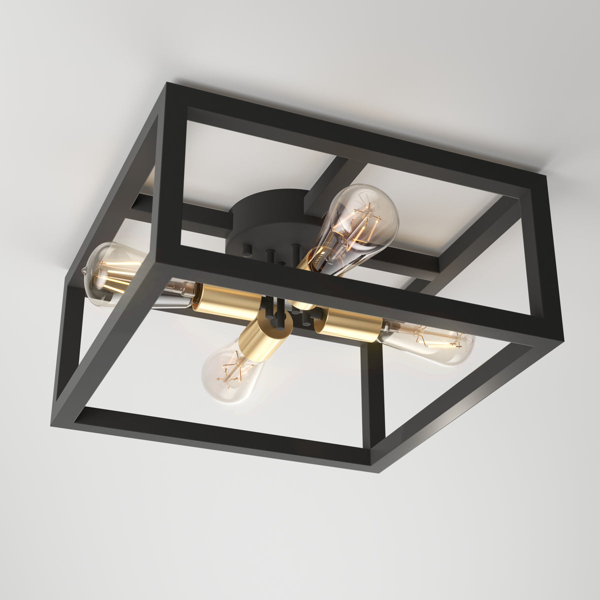 A modern ceiling light fixture with a black square metal frame, two exposed Edison-style bulbs, and brass accents, mounted on a white ceiling.