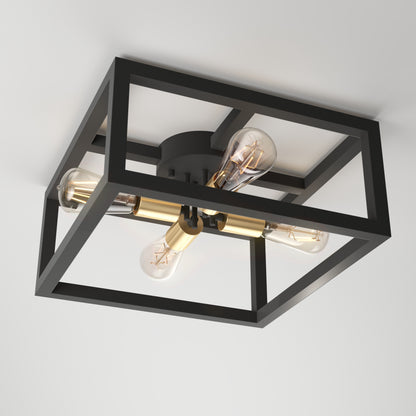 The Artika Princeton 4-light flush mount features a black rectangular metal frame with brass accents and four exposed bulbs in a cross pattern, installed on a white ceiling.