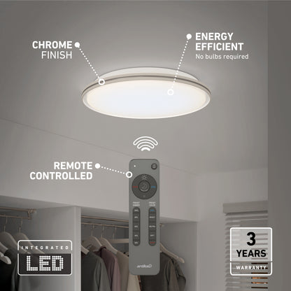 The Artika Astrid 16.5 in. LED flush mount light offers 5 CCT options, chrome finish, energy efficiency, remote control, integrated LED, and a 3-year warranty—ideal for closets. Remote is pictured below the fixture.