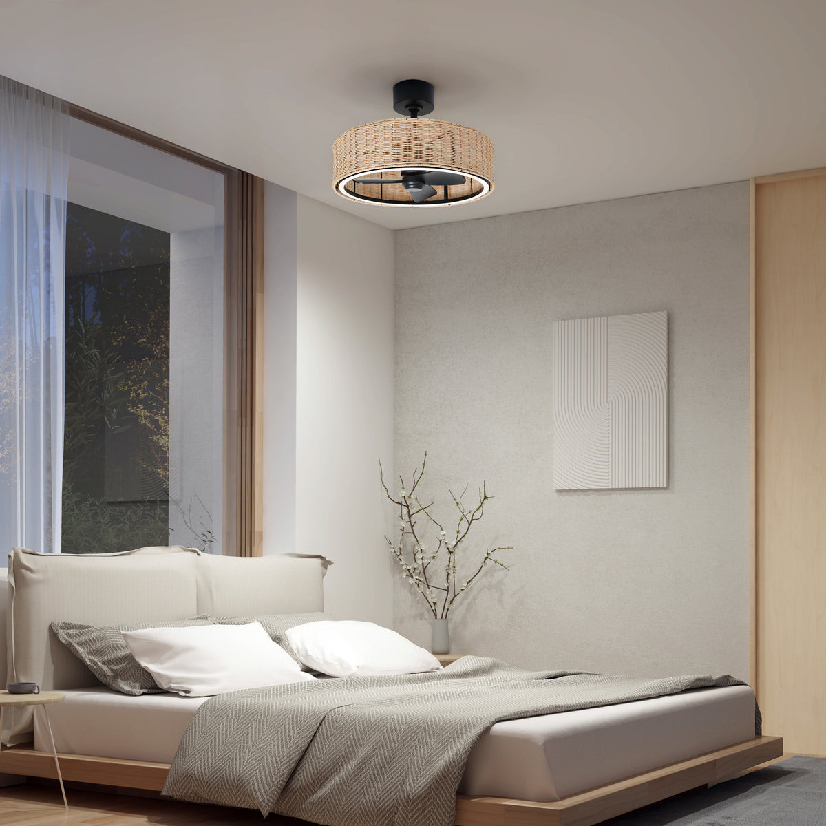 A modern minimalist bedroom with a low bed, neutral bedding, a large window, a textured artwork on the wall, a bare branch in a vase, and a ceiling fan with a woven rattan light fixture.