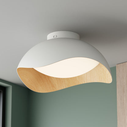 Adara 15 in. (38 cm) Modern LED Flush Mount Ceiling Light 5 CCT, a white dome-shaped light with a curved wooden interior rim.