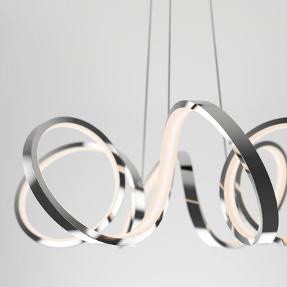 The Swirl Ribbon LED pendant light by Artika features intertwined metallic loops and integrated LEDs, suspended by thin wires against a plain, light gray background.