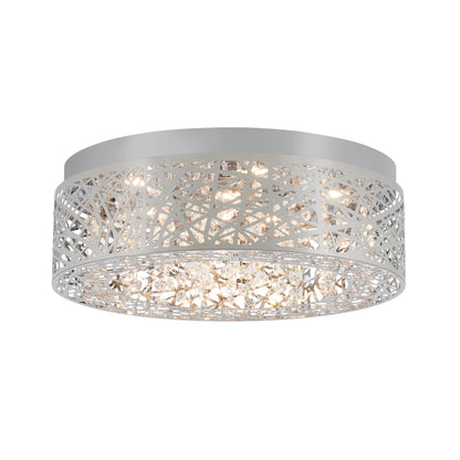 The Artika Crystal Nest LED flush mount is a modern ceiling light with a round silver metal frame, geometric cutout pattern, and sparkling crystal accents.