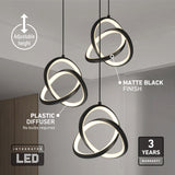 Three modern pendant lights with intertwined geometric LED rings hang from the ceiling. Features highlighted: adjustable height, matte black finish, plastic diffuser (no bulbs required), integrated LED, and a 3-year warranty.