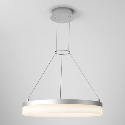 The Artika Optical LED pendant light 3 CCT features a modern circular design with a metallic frame and frosted diffuser, suspended by three slim cables from a round ceiling mount, shown against a plain light gray background.
