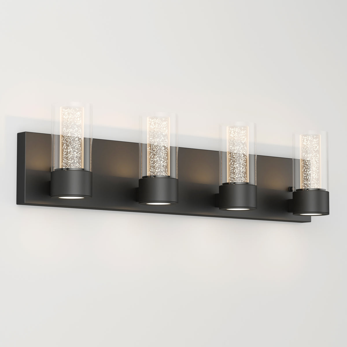 Artika Essence 27-in LED Vanity Light: a sleek, modern 1-light bathroom fixture with a rectangular black base and sparkling glass shade.