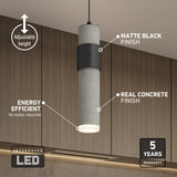 A modern cylindrical pendant light with a matte black and concrete finish hangs over a kitchen counter. Labels highlight its adjustable height, energy efficiency, integrated LED, and 5-year warranty.