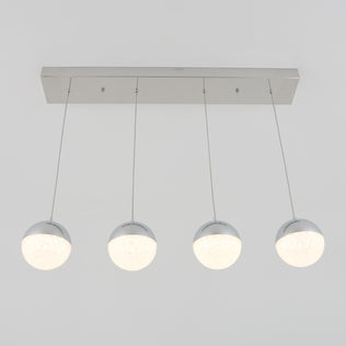 The Artika Sparkle 4-light LED pendant features four frosted glass globes suspended by slim wires from a sleek rectangular metallic base, creating a modern statement for any space.