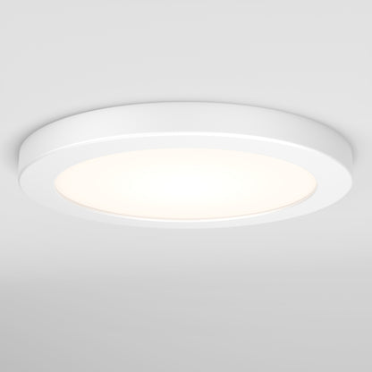The Artika Europa Disk 7 in. LED modern flush mount light, featuring 3 CCT settings, offers a sleek round design and emits a soft, even glow when mounted on a smooth white ceiling.