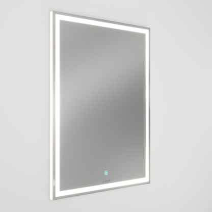 The Artika Emeraude dimmable LED mirror 3 CCT is a rectangular, wall-mounted mirror with edge LED lighting, a modern minimalist design, and a touch sensor button at the lower center, shown against a plain white background.