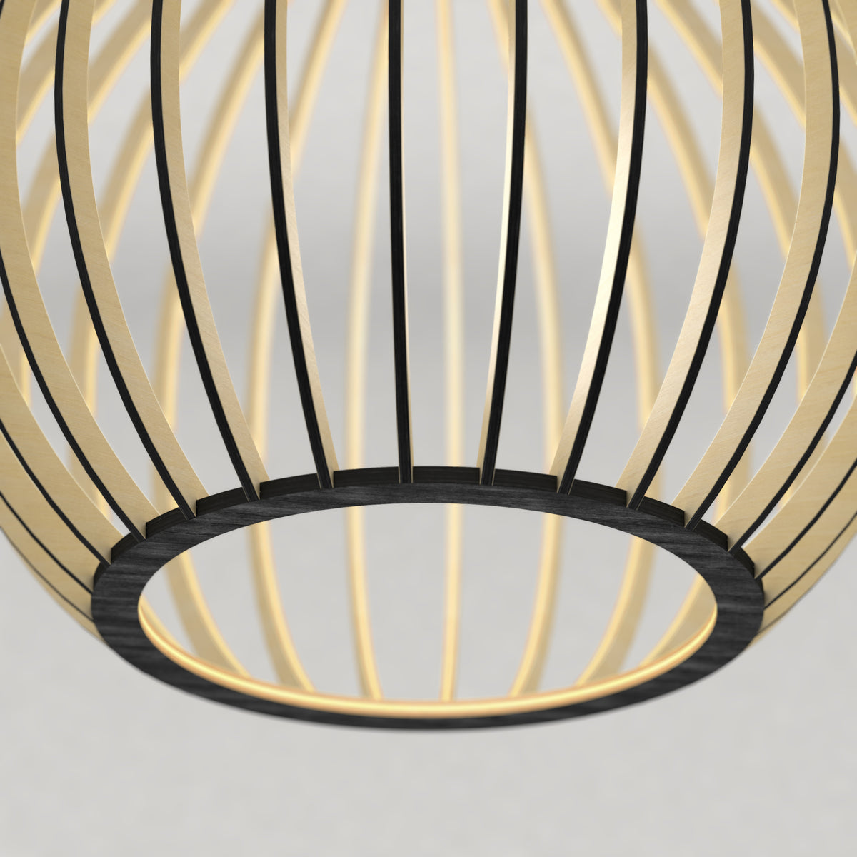 Close-up of the Artika Tomi LED Pendant Light 3 CCT, featuring a circular black frame and curved golden slats in an open, cage-like design against a neutral background.