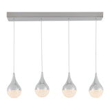 Four modern pendant lights with chrome teardrop-shaped fixtures hang in a row from a rectangular ceiling mount, each glowing softly with a textured inner surface.