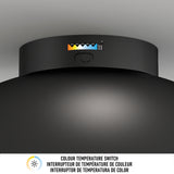 A close-up of a black circular ceiling light fixture shows a color temperature switch with labeled options and a button. Text below reads COLOUR TEMPERATURE SWITCH in English, French, and Spanish.